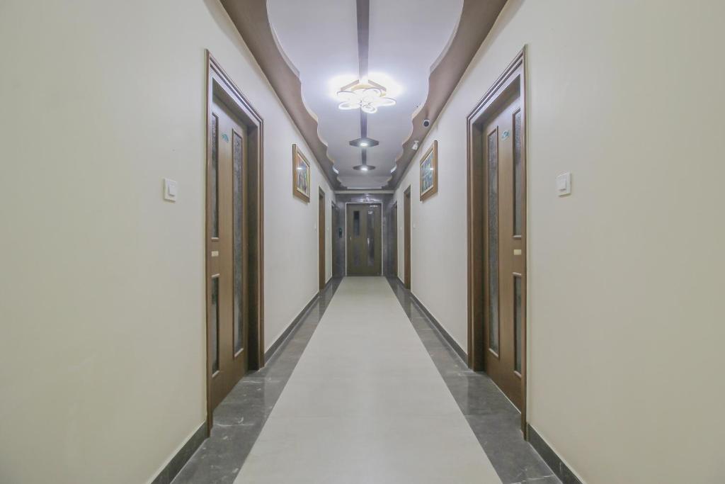 Clean corridor at Delight Inn Stays - well maintained hotel